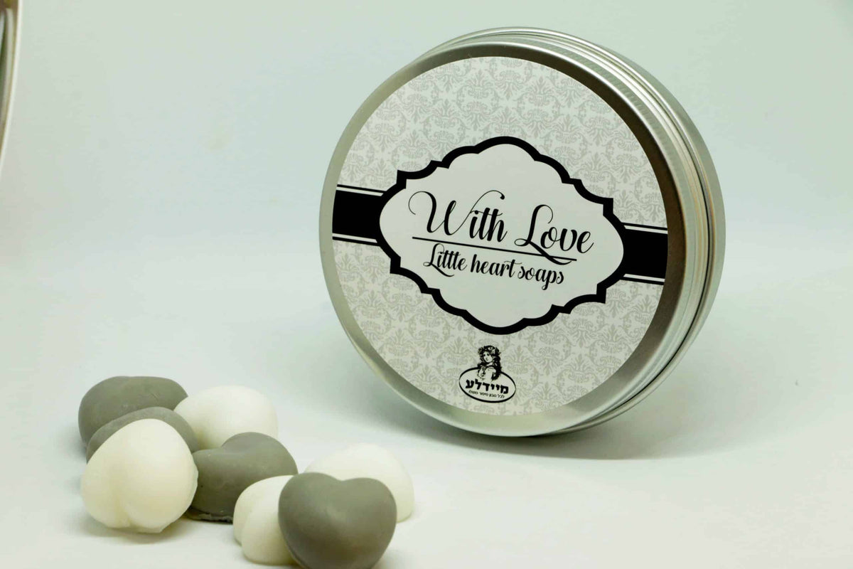 A box of heart-shaped soaps in a round metal tin - with love