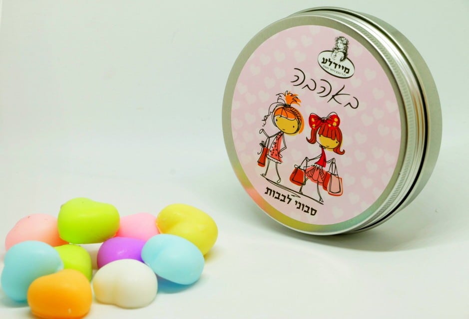 A box of heart-shaped soaps in a round metal tin - with love