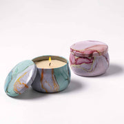 Soy candle in a colorful tin, marble patterns