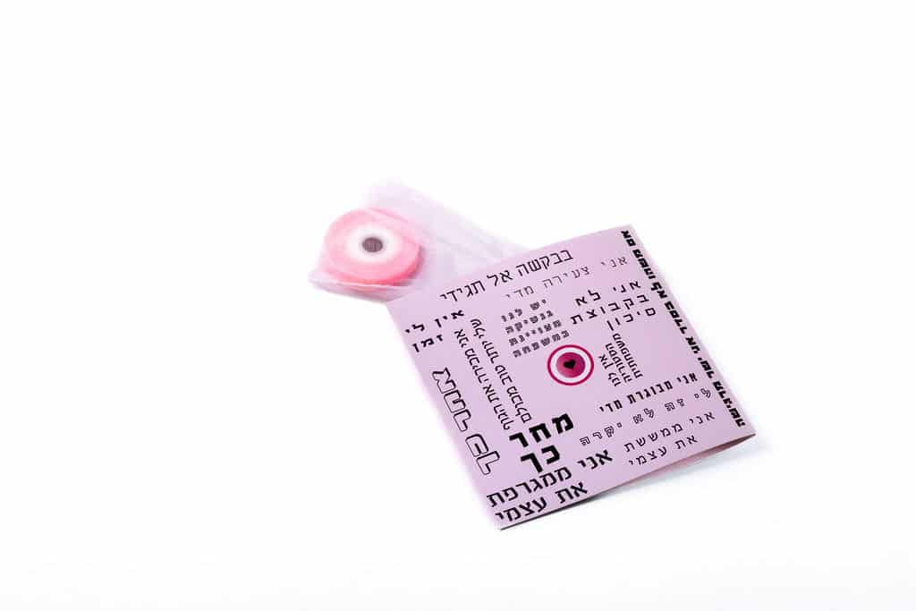 Go get checked – Breast Cancer Awareness Month – A little pink good eye with a folding card