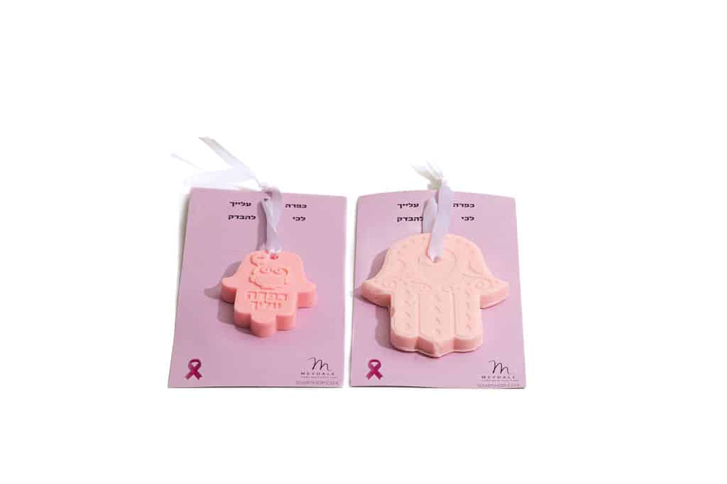 Hamsa soap accompanied by a "Go Get Checked" card - Breast Cancer Awareness Month