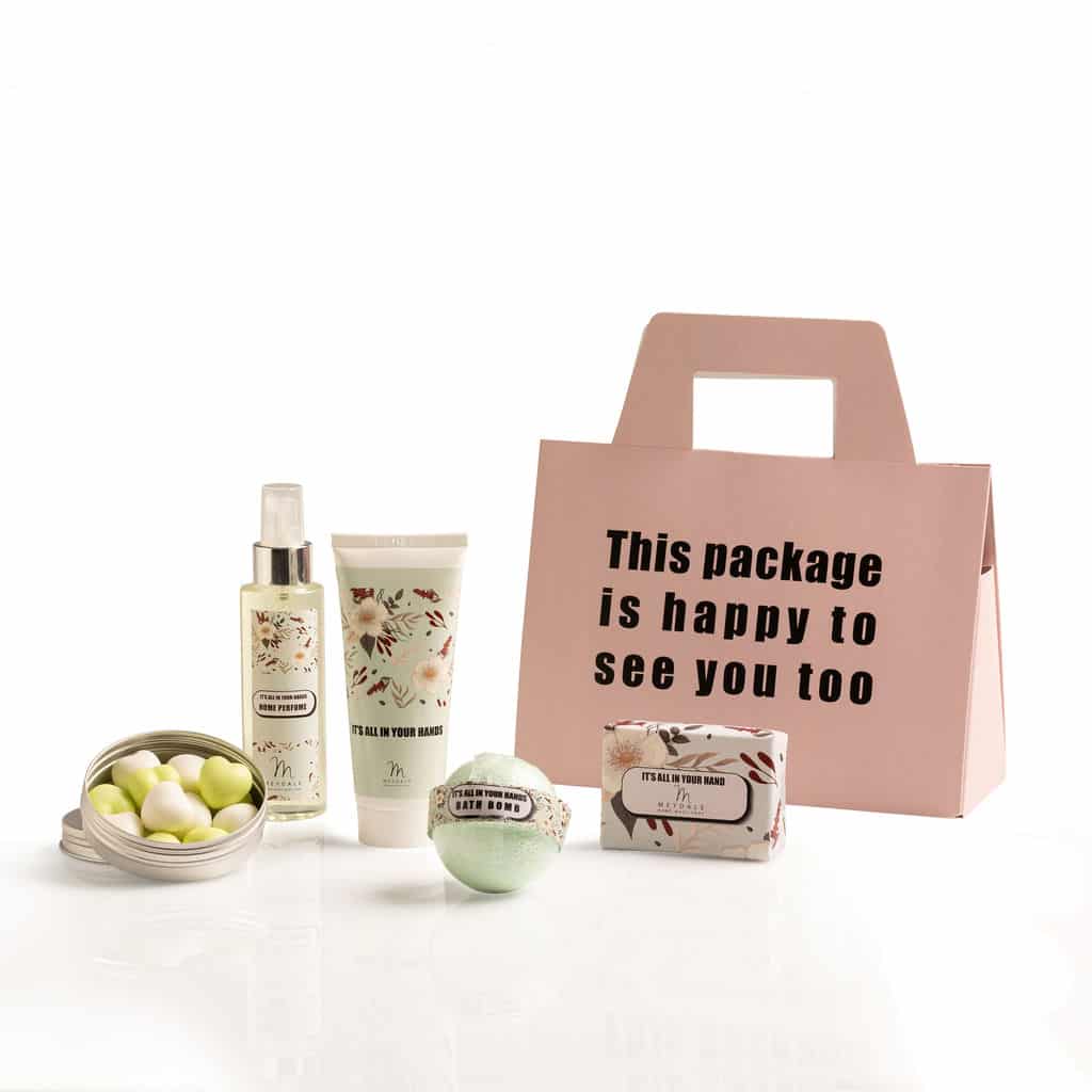 Festive floral gift box - green, packaged in a gift bag box